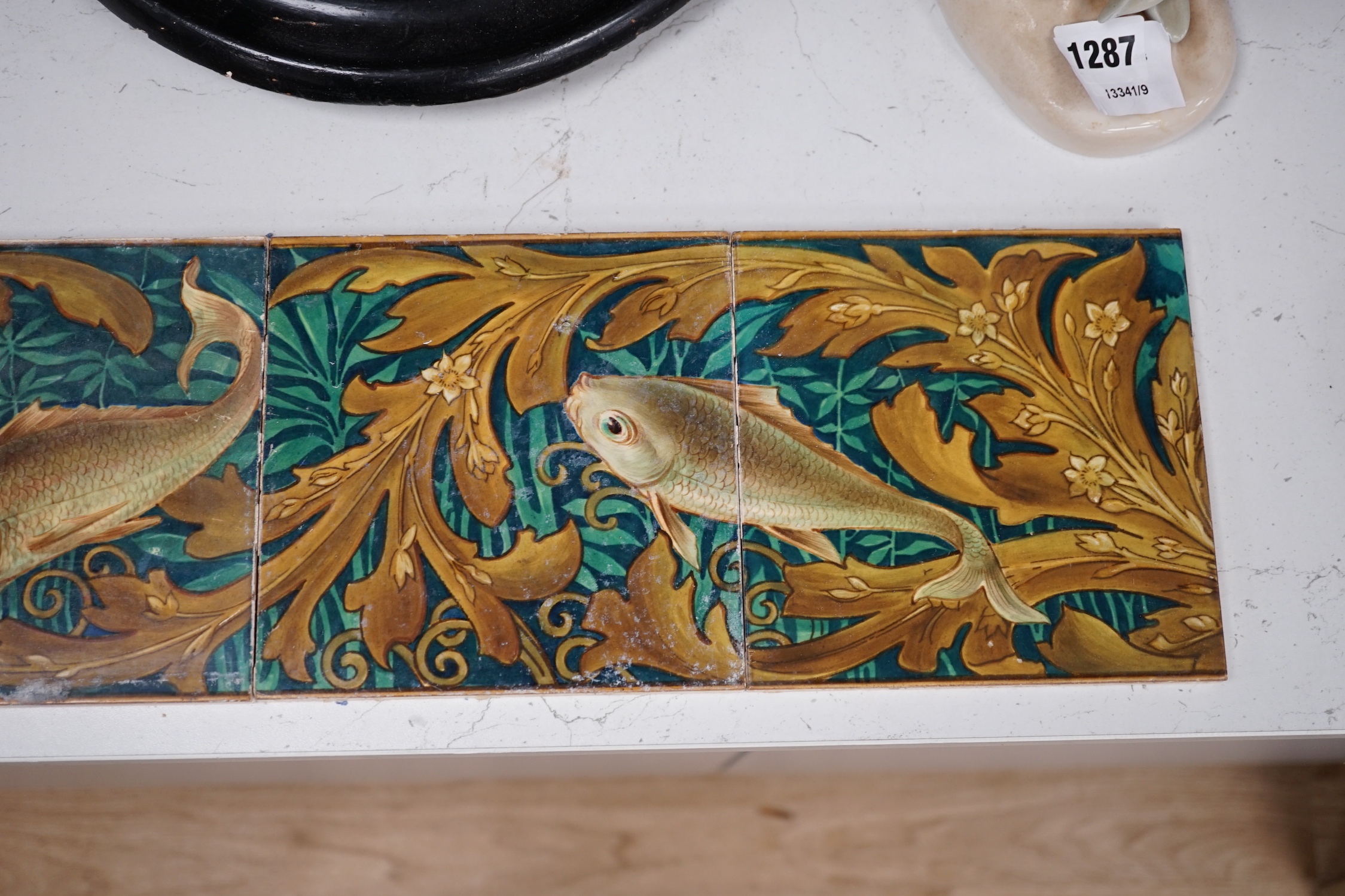 A set of six Victorian ‘fish’ decorated tiles by WB Simpson, 15cmsq